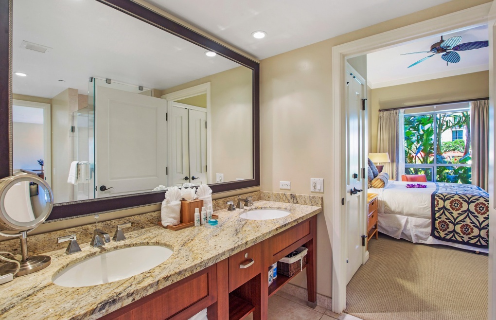 The guest bathroom also offers a double granite vanity