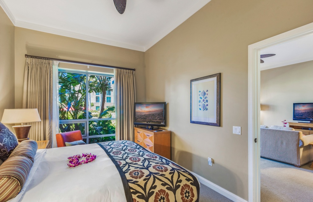 The guest bedroom offers a king size bed