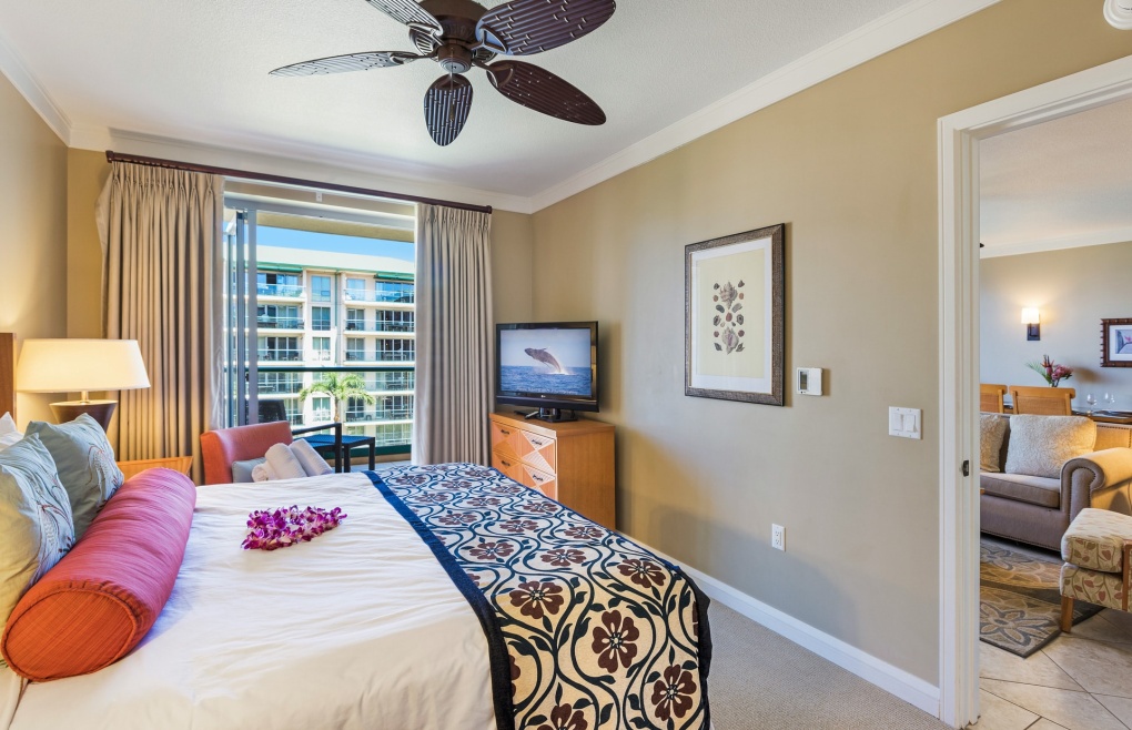The master bedroom offers balcony access
