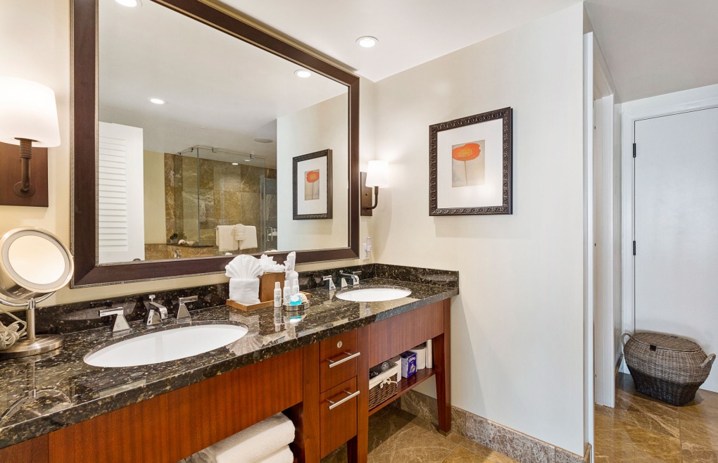 The second master bathroom offers a double granite vanity