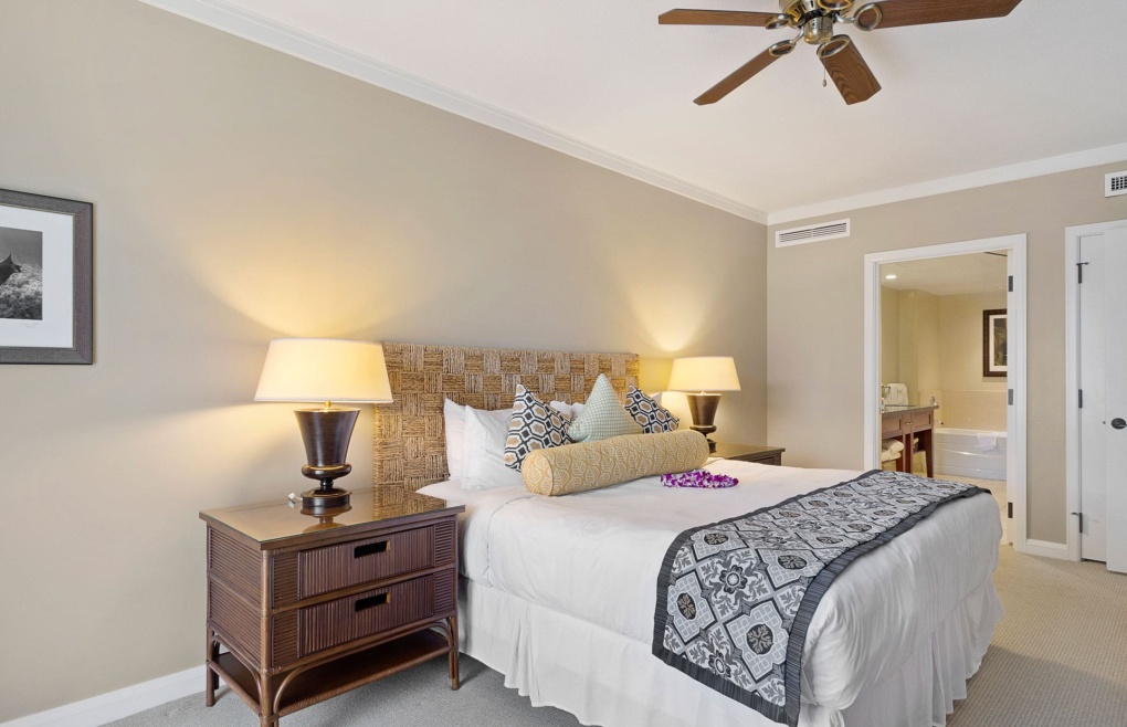 The master bedroom features a sumptuous king-size bed