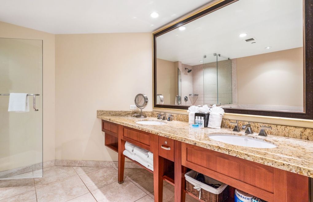 Second bathroom has a double granite vanity