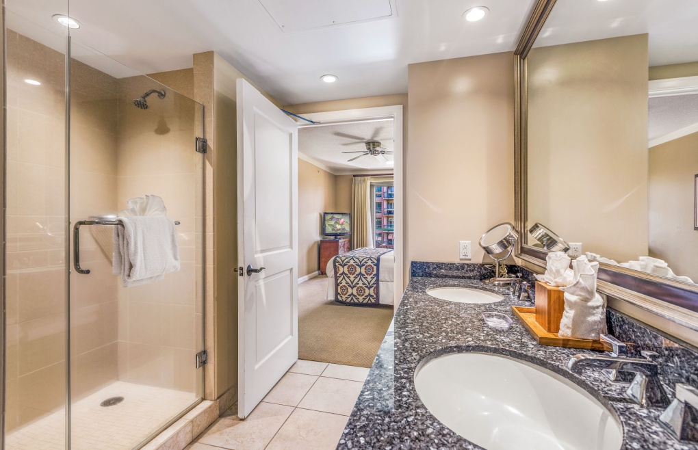 With a glass walk-in shower and separate soaking tub