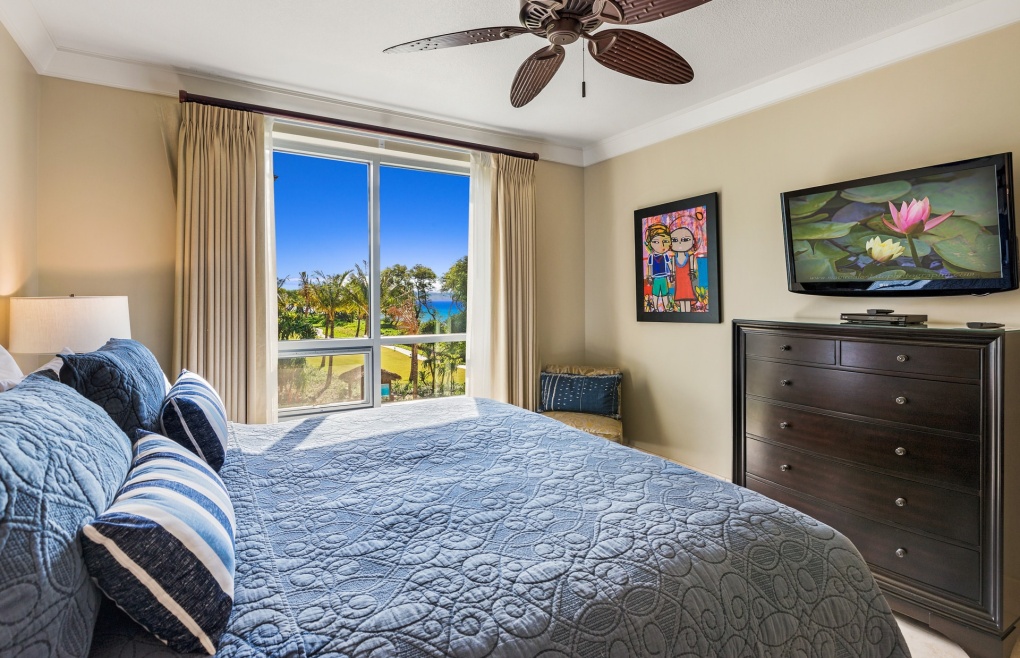 The second master bedroom also offers a king size bed and ocean views